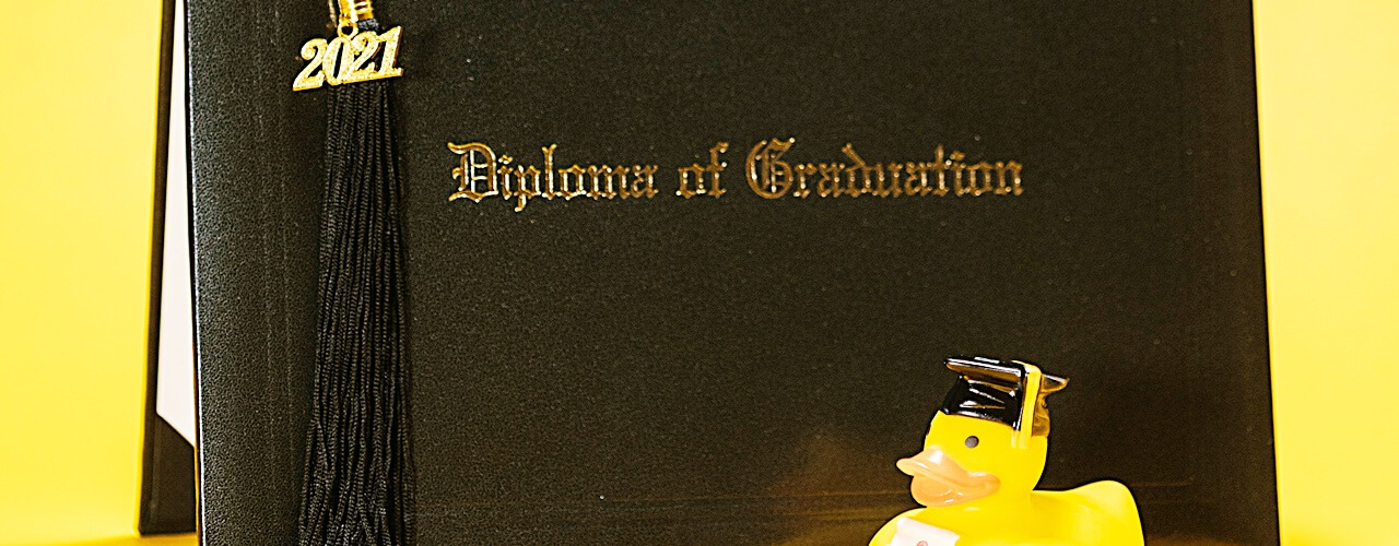 A picture of a diploma holder containing Apostille Diploma.