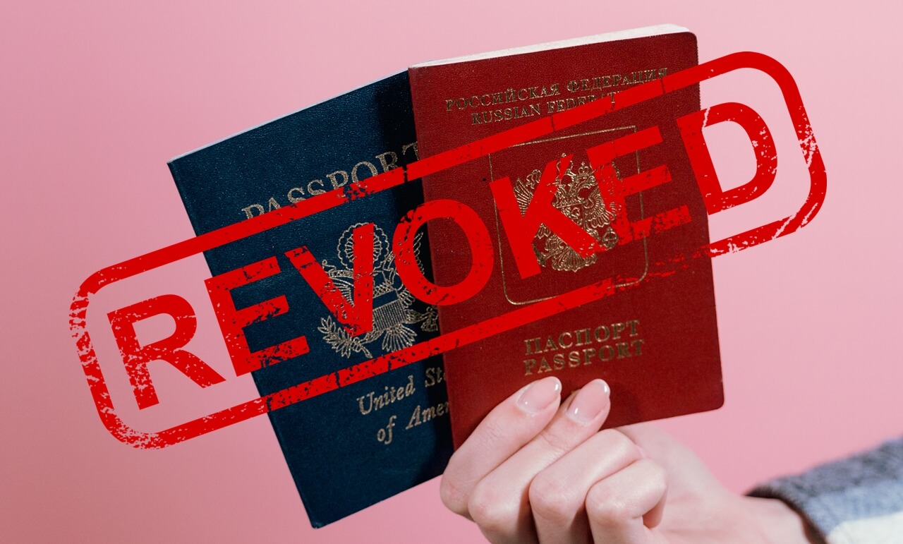 A lady holding revoked passports symbolizing enforcement of Child Support from a foreign father who is not compliant.