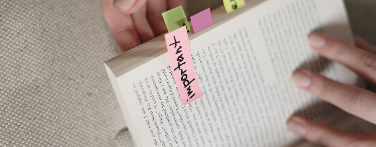 Sticky notes labeled as important in the law book page where to read what should a Prenuptial agreement Philippines contain.