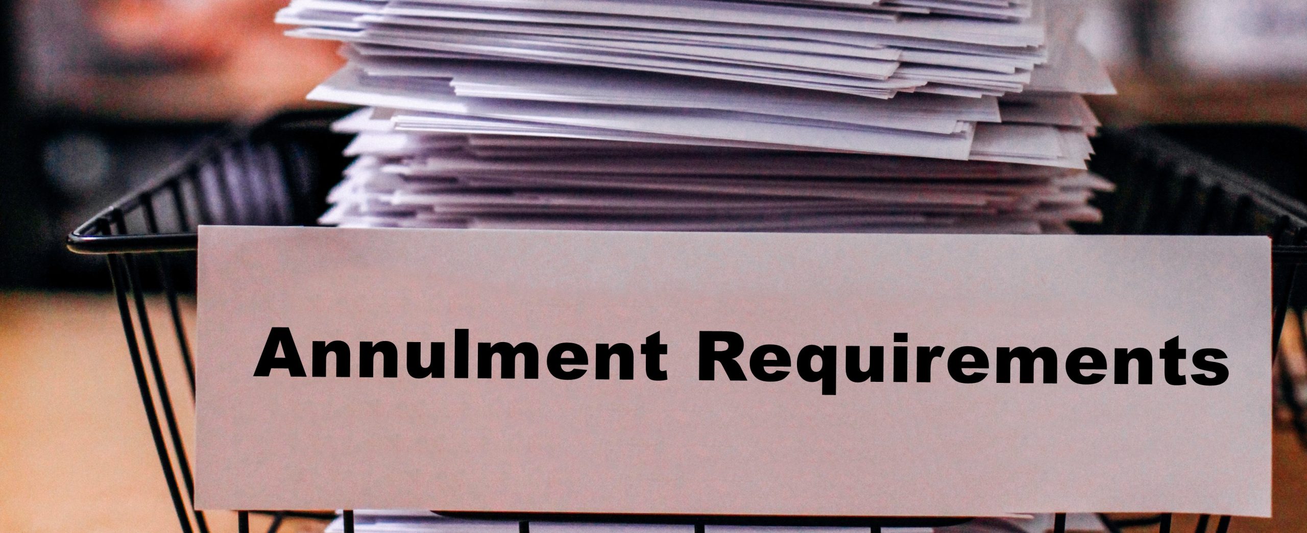 Annulment requirements text overlaid on a tray of papers